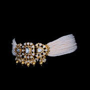 Polki piece enhanced with moti detailing.Chawker